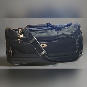 Leisure Dark Green Rolling Duffle Bag
